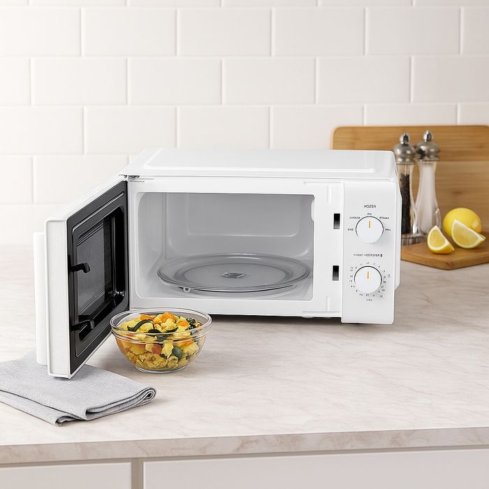 Компактна микровълнова фурна Comfee - 20 литра, 700W и 5 нива
