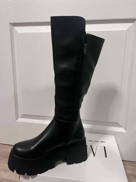 Високи дамски ботуши