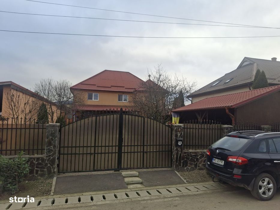 Casă in sangeorgiu de mures , garaj și mansardă utilizabilă