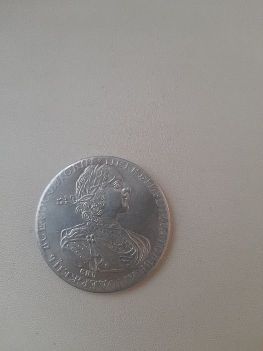 Рубль 1837год. Рубль 1724год.