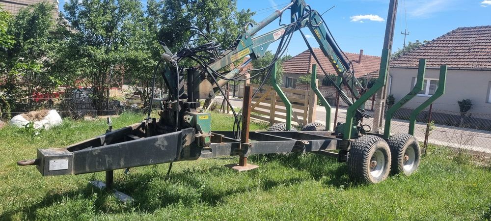 Vând sau schimb remorca forestiera cu macara