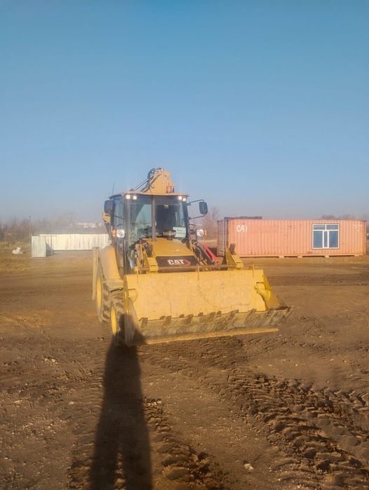 Услуги экскаватора CAT