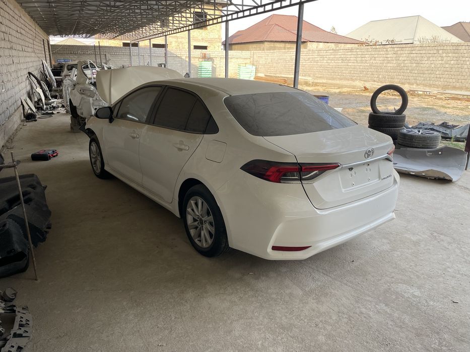 toyota corolla 210 бампер крыло