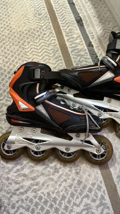 Роликовые коньки