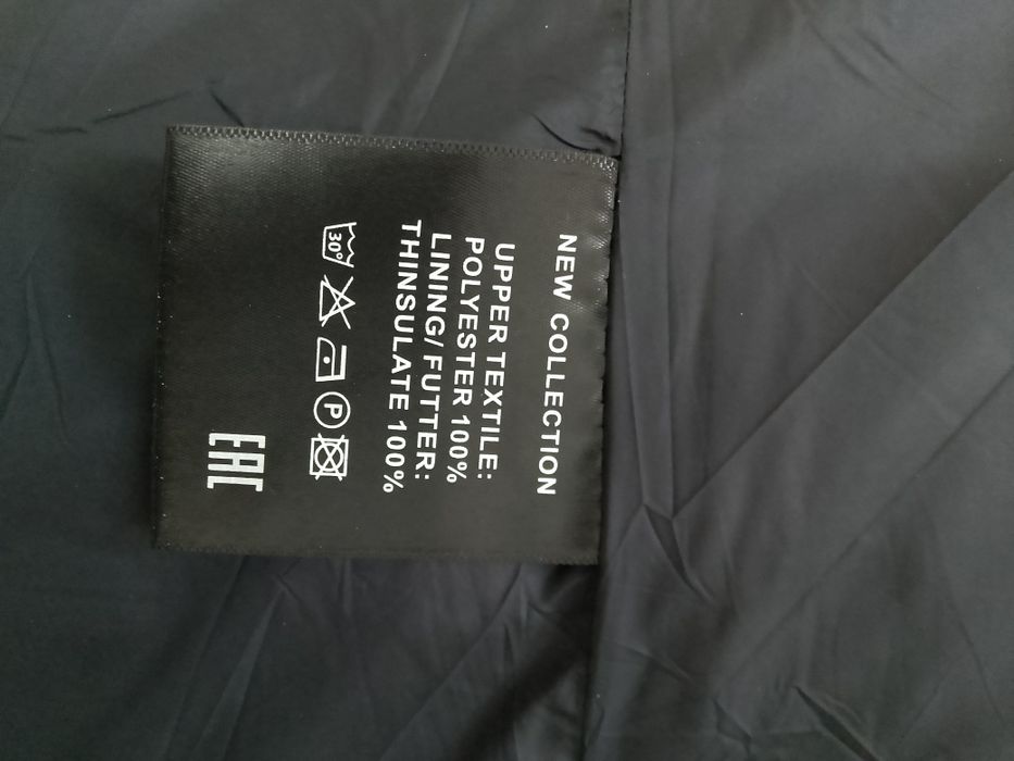 Продам пуховик, размер на 58.