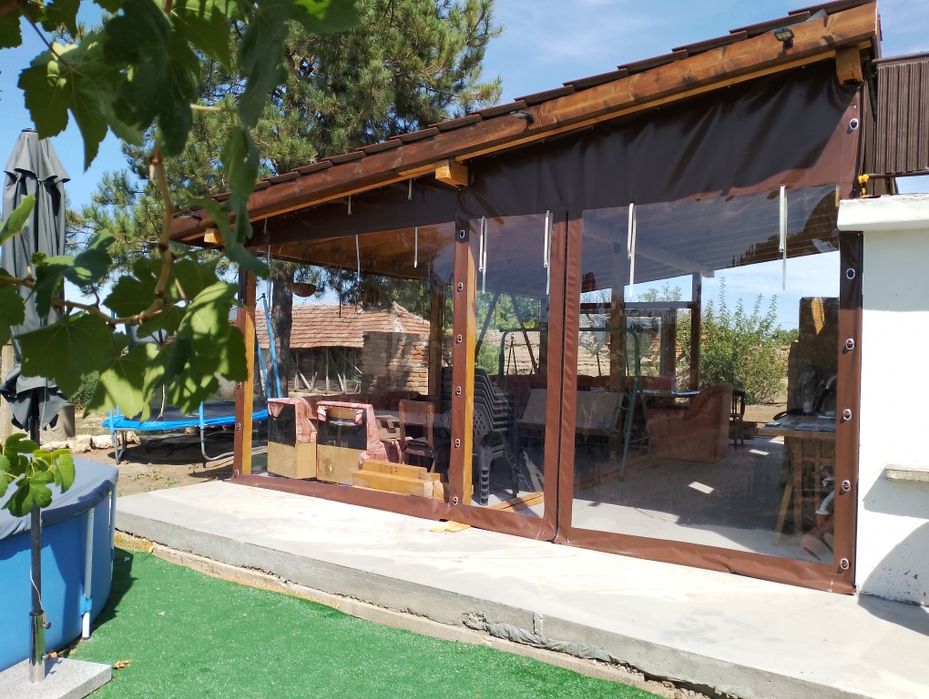 Изработка и монтаж на тенти и ветроупорни завеси