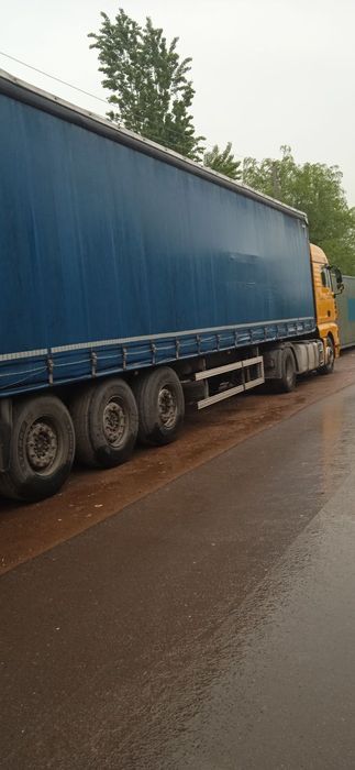 Продается SHCMITZ S01 с полуприцеп универсал MAN TGA 18430 4x2 BLS