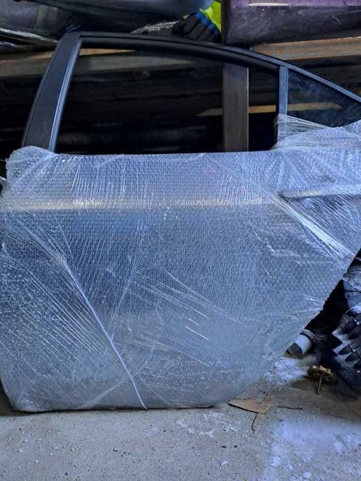 Дверь Nissan Primera QP12