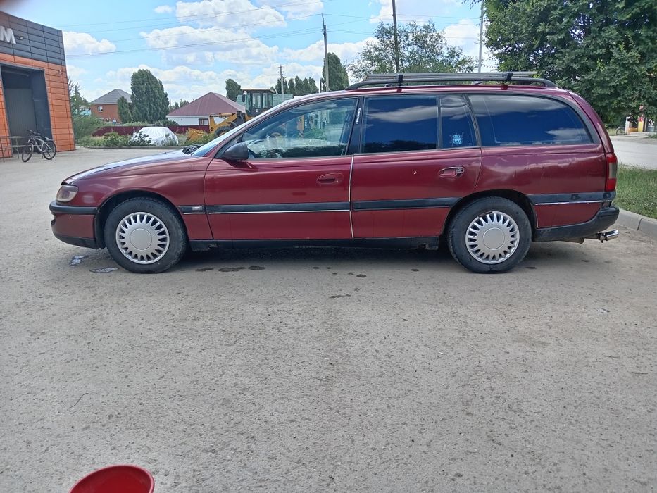 Опель омега объём 2,