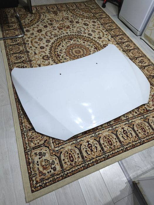 Капот ла Mitsubishi lancer 10