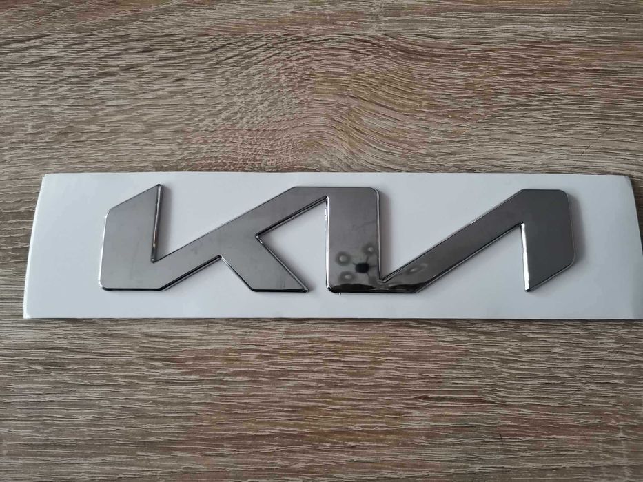 Лого Kia сребрист гланц 15см