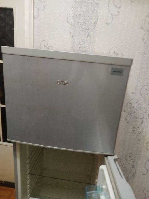 Холодильник. Смеситель для кухни