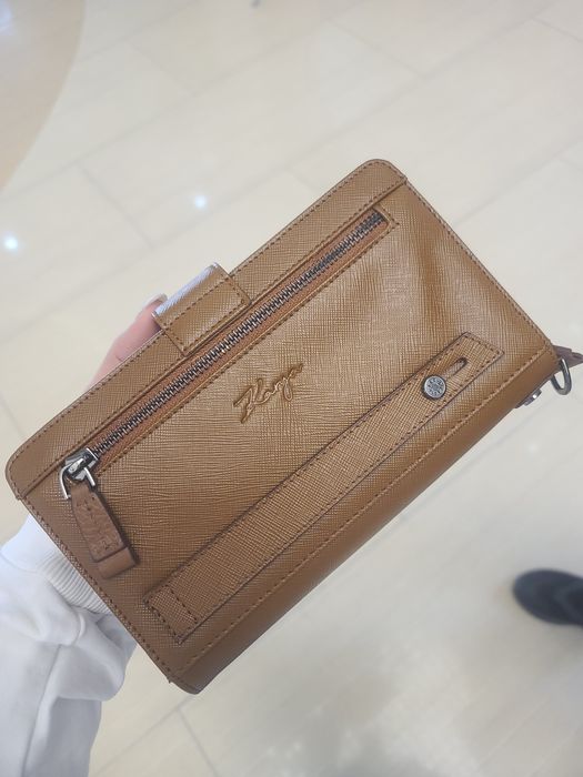 Продаётся мужской клатч- портмоне из натуральная кожа. Бренд Karya