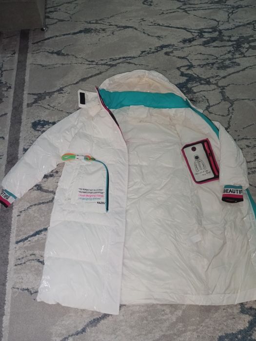 Продам новые пуховики 48рр