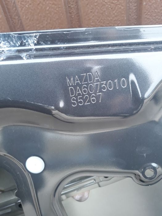 Usa stanga spate mazda 2