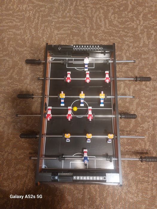 Joc de fotbal ,masa fotbal