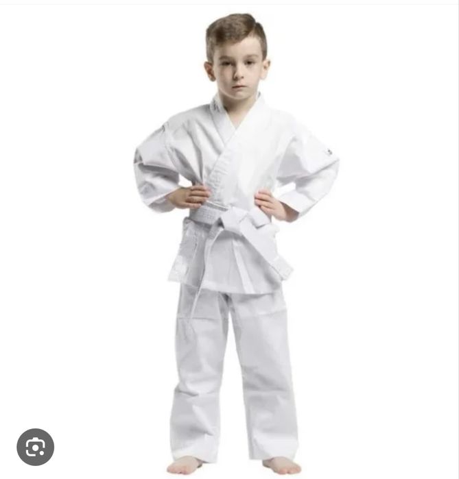Отдам  костюм для каратэ