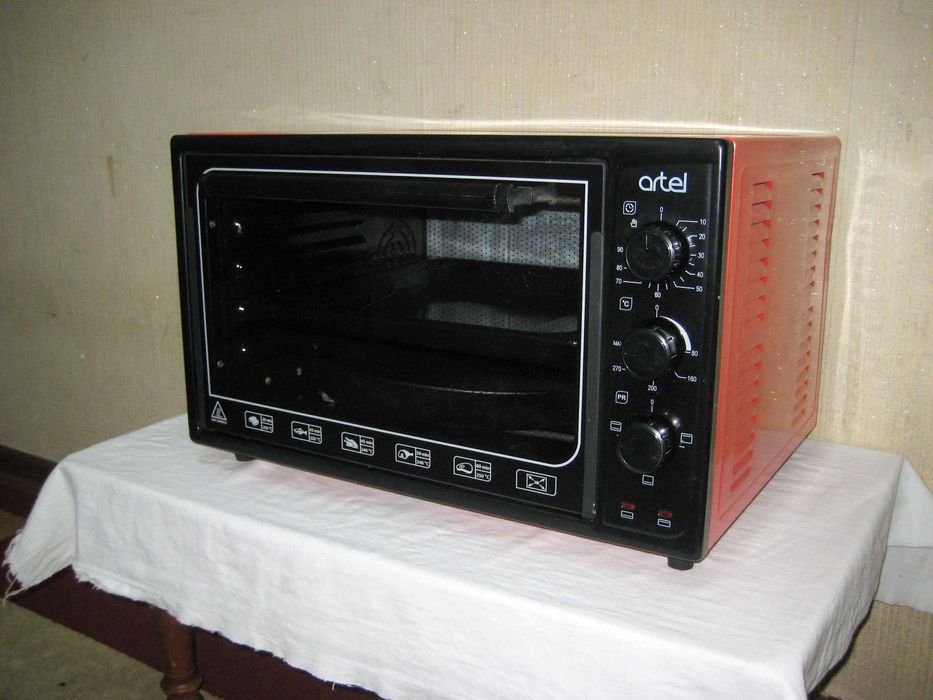 Печь духовка 40лт деярли янги куп ишламаган почти новая малоползвано!