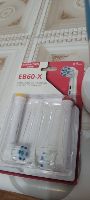 Электрическая зубная щётка