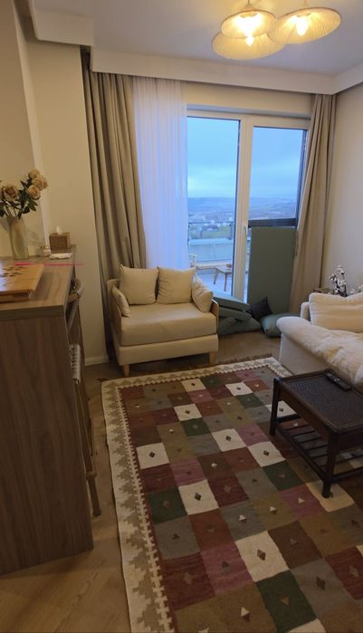 Fotoliu extensibil tapitat crem