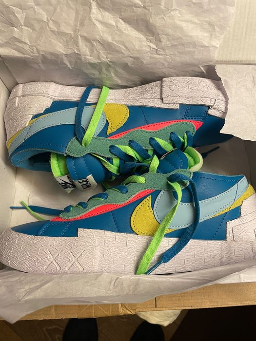 Nike Blazer Low
sacai KAWS Neptune Blue