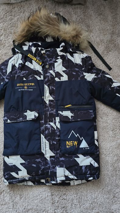 Продам зимнию куртку на мальчика