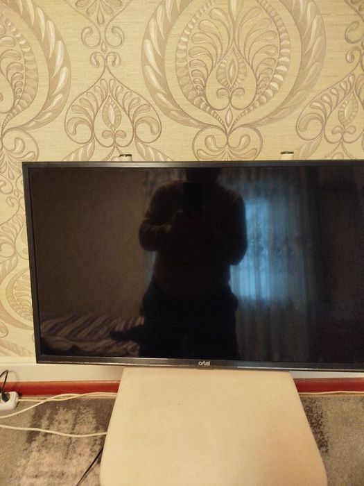 Artel televizor o'lchami 32