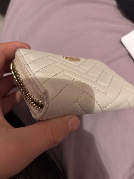 Портомне на GUESS