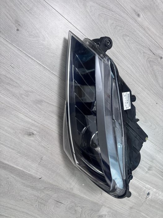 Far stanga superb 3 III bi xenon adaptiv