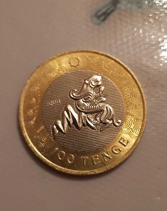 Монета 100₸ сакский стиль. Крылатый барс