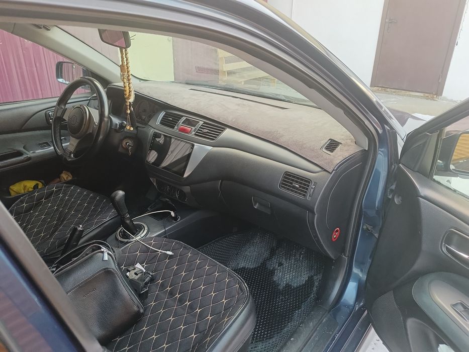 Авто Лансер 9 универсал хтс