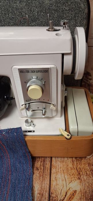 Masina de cusut privileag