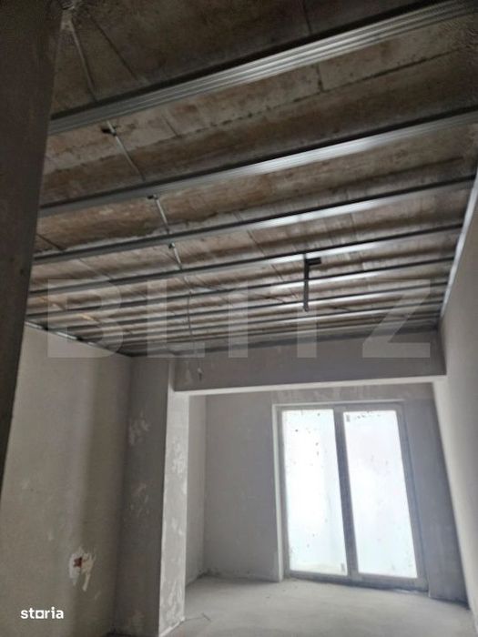 Apartament 3 camere, 2 bai, decomandat, etaj intermediar, zona Tractor