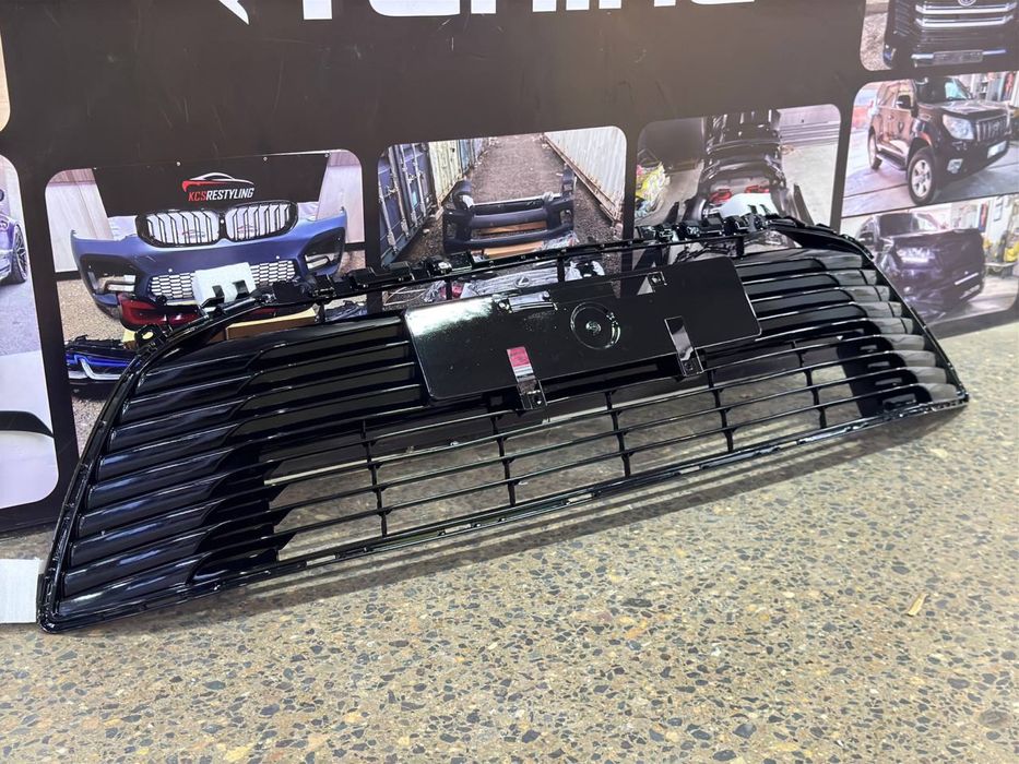 Решетка радиатора Toyota Corolla 210