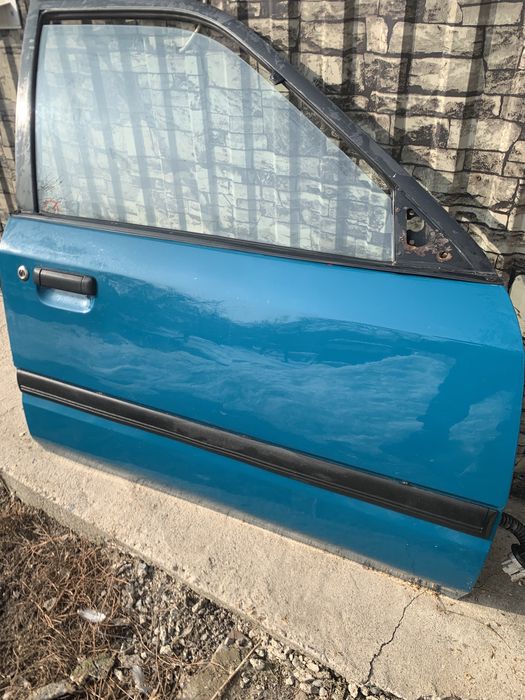 Двери на мазду 323 седан