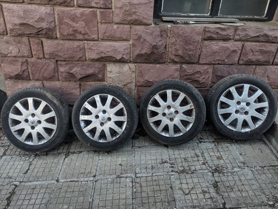 Джанти с гуми за Nissan Almera N16