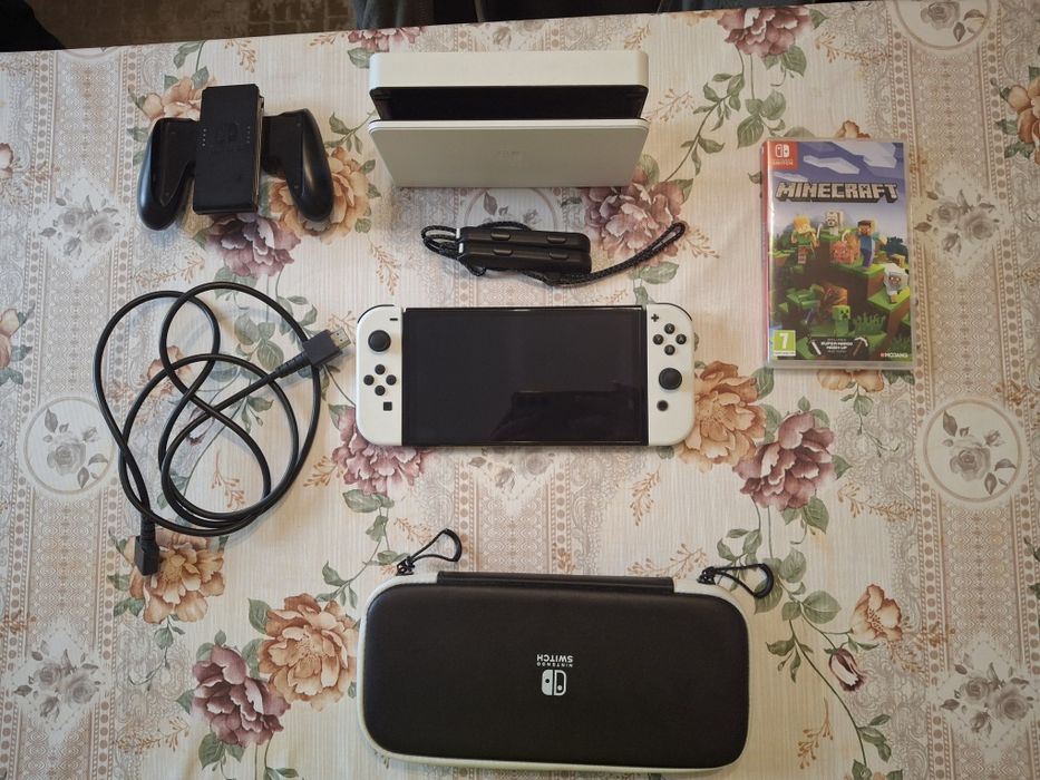 Vând Nintendo switch Oled + accesorii