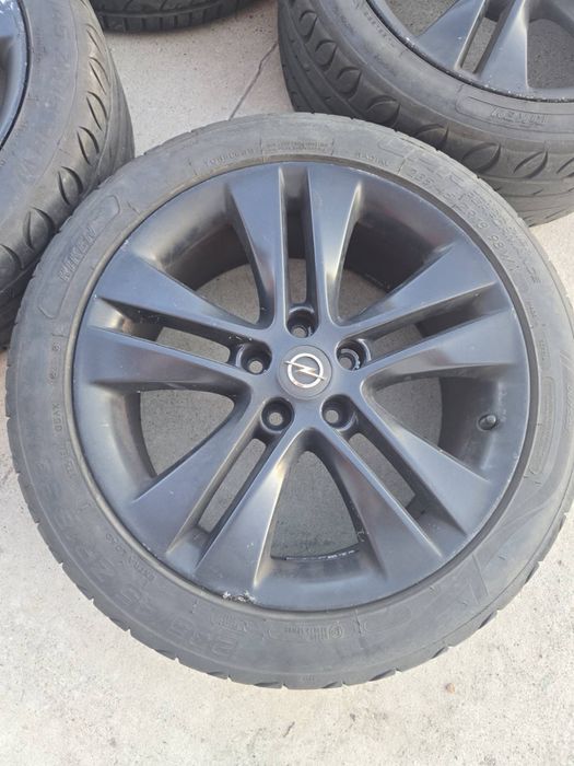 Оригинални лети джанти 18" 5x115 за Opel с летни гуми Riken 235/45 ZR18
