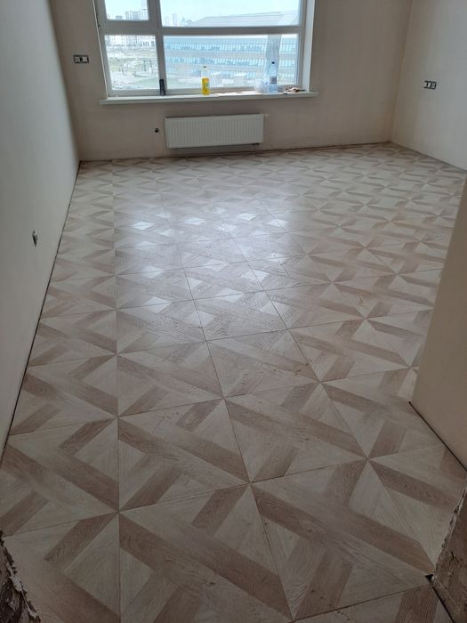 Укладка ламината, кафель ,керамогранит.