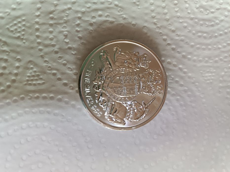 Монета серебряная
