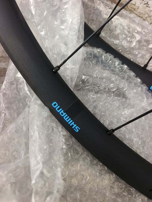 Капли Гравел Shimano GRX WH-RX570-TL Wheelset-12x100mm | 12x142mm - HG