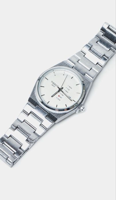 Часы Tissot металические белого цвета
