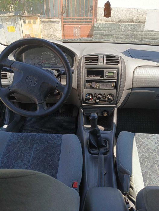 Mazda 323 1999г