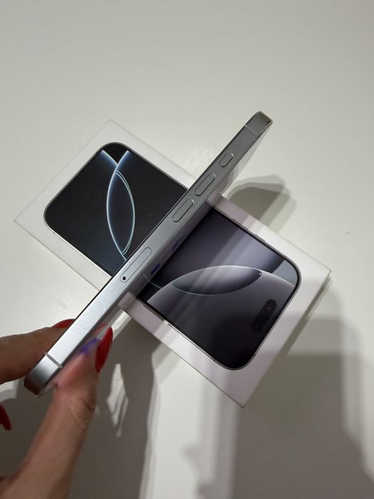 vand iphone 16 pro  alb