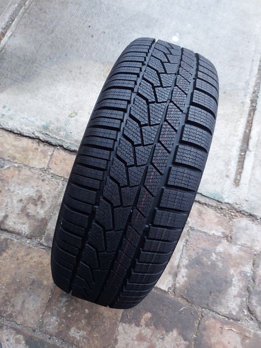 O bucată 205/60 R16 M+S iarnă - una Continental