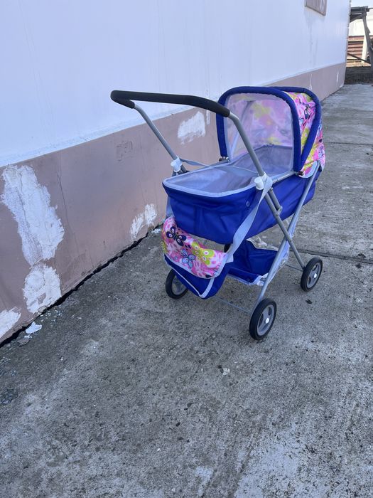 Детская игрушечная коляска