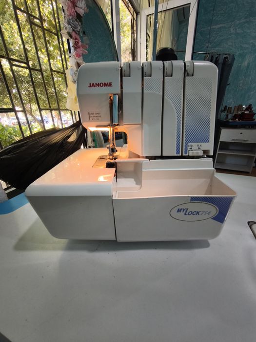 Оверлок janome may lok 714  .