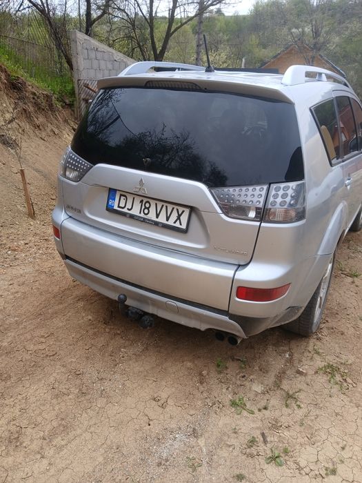 Vind Mitsubishi  Qulender An fab 2008 Amotor 2000 cm Geamuri electrice  ac  4x4.