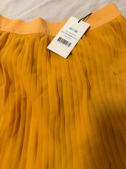 Плисирана пола в цвят тиквено оранжево, размер 38 EU/M