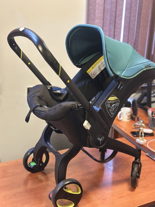 детское автокресло-коляска Doona